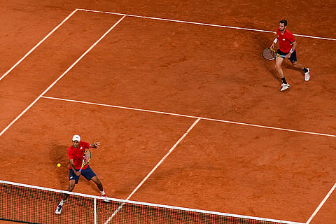 Austin Krajicek and Rajeev Ram of the USA compete in men's doubles quarter-final 